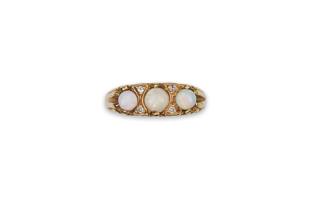 An opal and diamond ring, mid 20th century